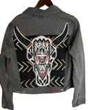 Gray Denim jacket with added hand beaded Black n white cow skull on African Mud cloth