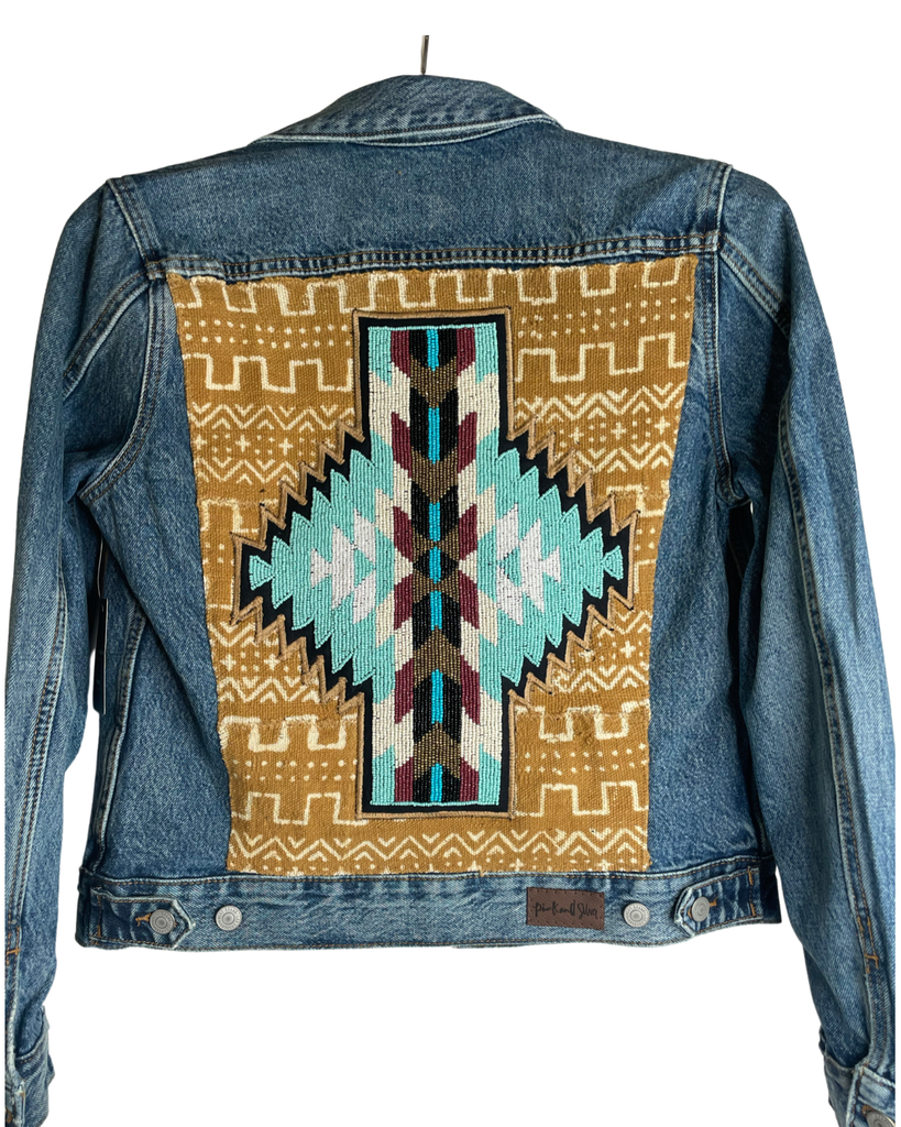 Denim jacket with added hand beaded Southwest design on African Mud cloth