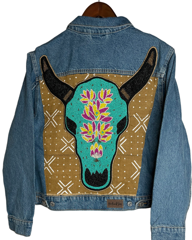 Denim jacket with added hand beaded Turquoise cow skull on African Mud cloth