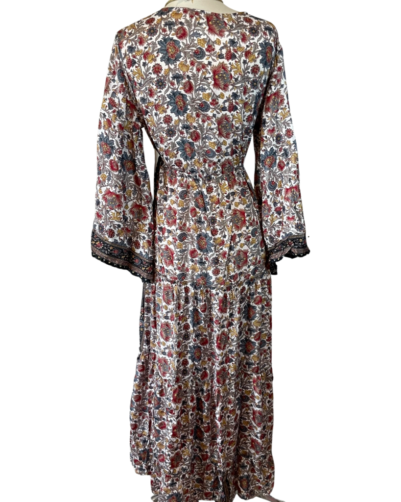 https://www.vicicollection.com/products/maxi-dress-with-bell-sleeves Honey Shadow Tiered Bell Sleeve Maxi Dress VICI